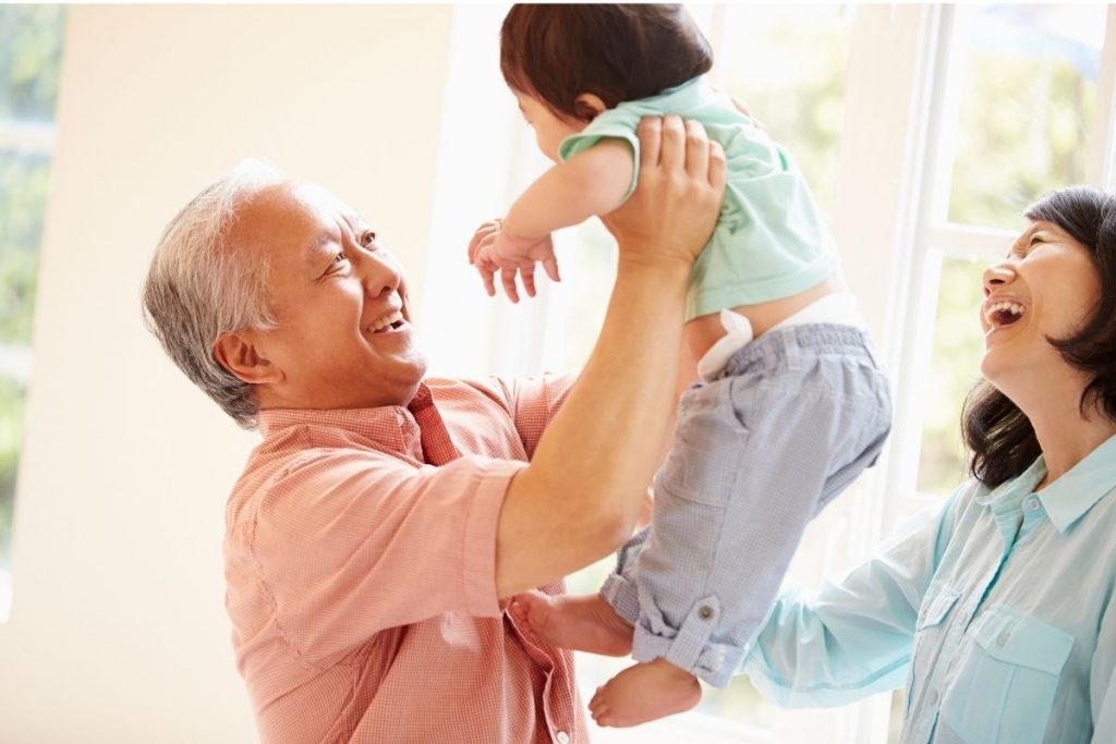 grandparents enjoying time with grandchild